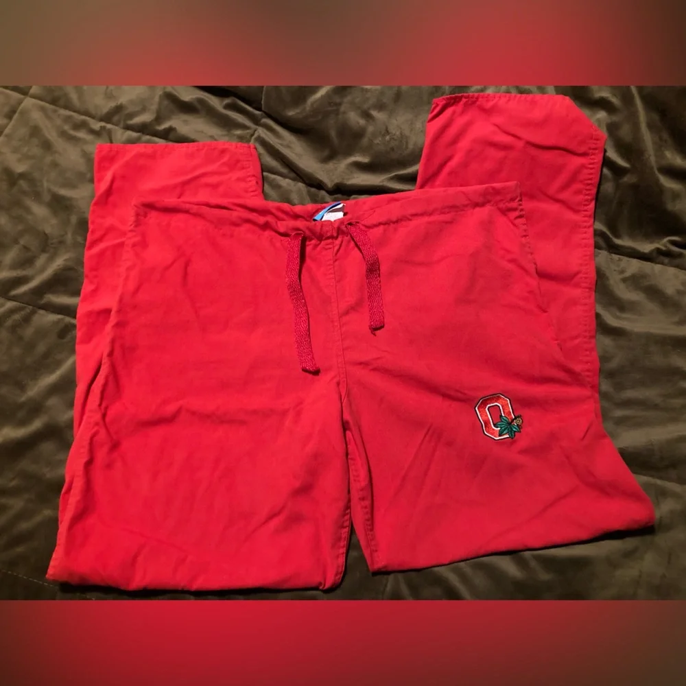 Red Ohio State Buckeyes scrub pants, size medium, small stain under pocket